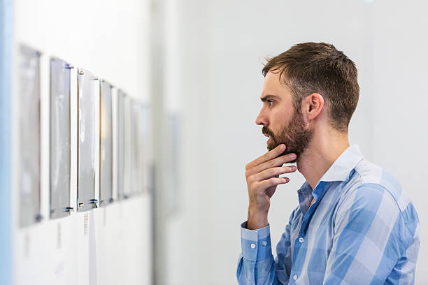istock Hipster Man Visiting an Art Gallery 520137016