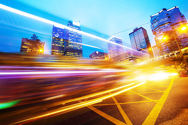 istock traffic light trails of modern business city 520138037