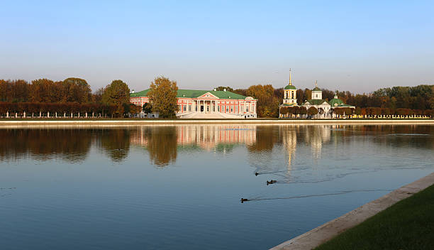 istock autumn landscape with a palace and a pond 520163913
