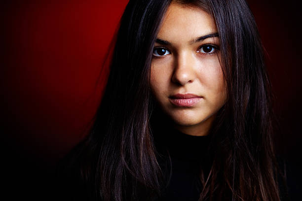 istock Woman in dark room 520165403