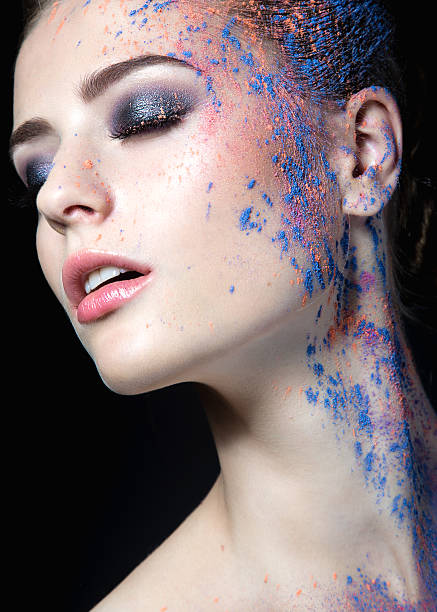 istock Girl with paint on her face 520166211