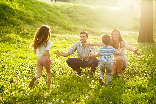 istock Two kids running to their parents in parks 520167180