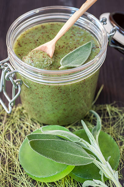 istock Body scrub with herbs for spa treatment 520167411