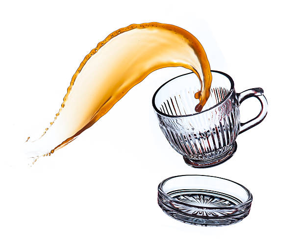 Splash coffee in glass cup,