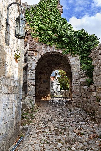 istock Ancient arch pathway on a Bar old town in Montenegro 520170496
