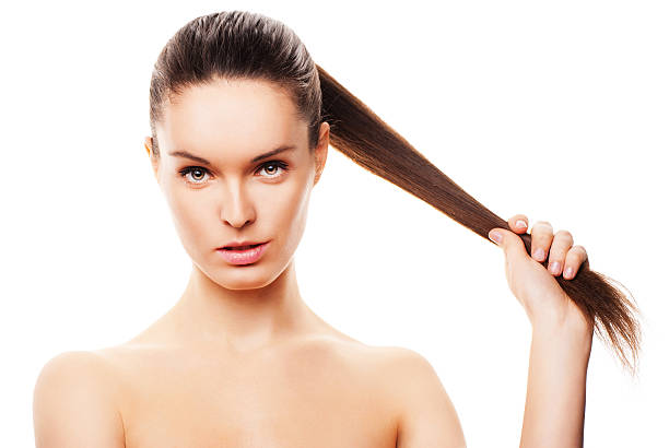 istock Beautiful woman's face with clean skin on white 520172146