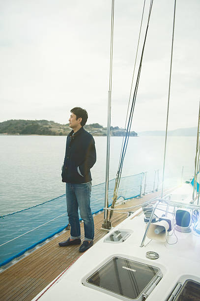 istock Mature man standing on a yacht 520172382