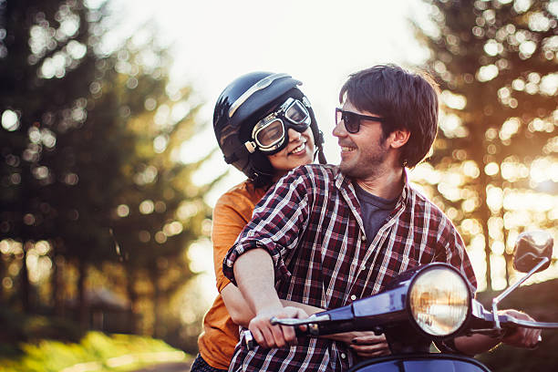 istock Happy couple on a scooter at summer vacation 520172400