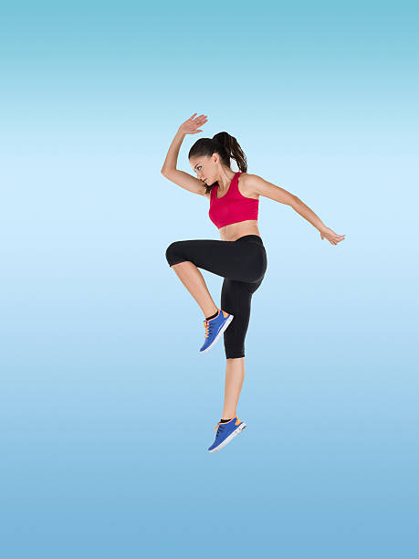 istock Portrait of athlete jumping in mid air 520176578