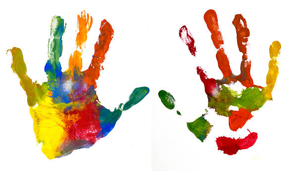 istock Hands Kid painted, stamped on paper, isolated on white 520179158