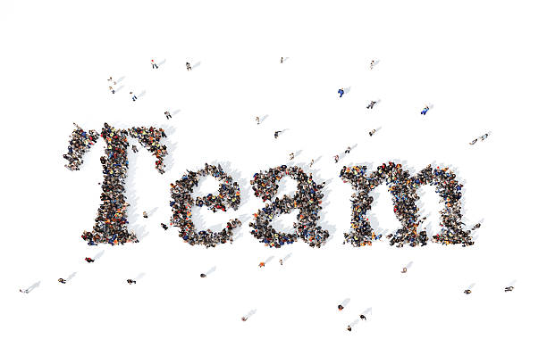 istock Group of people forming the word team 520179364