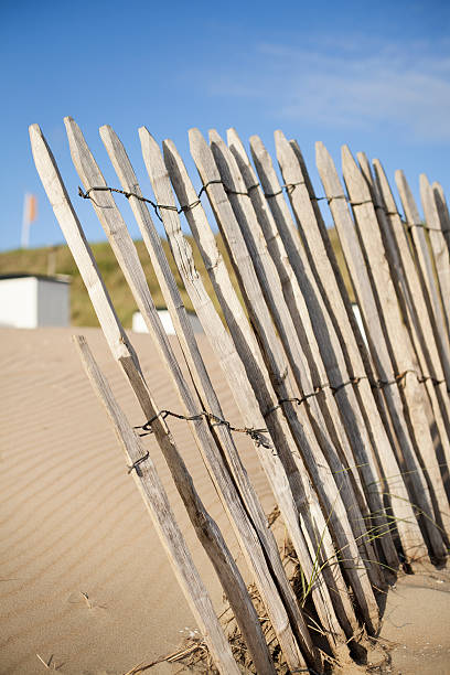 istock Wooden fence on the beach 520190799