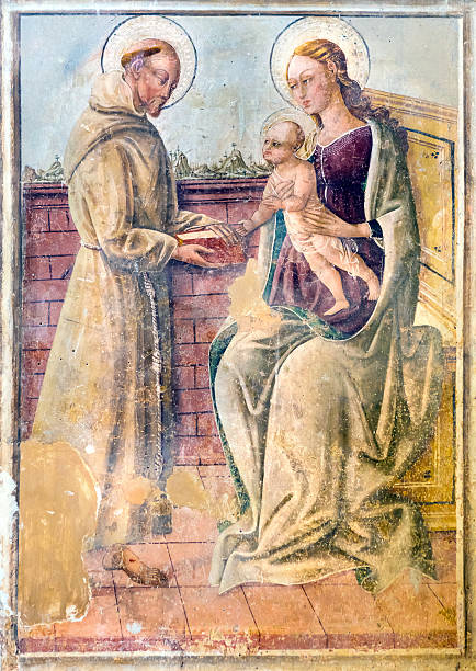 istock St. Francis of Assisi presenting his book 520190913