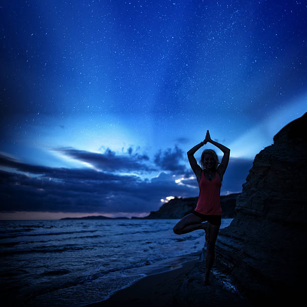 istock Greeting to the Sun in Yoga Tree position 520191709