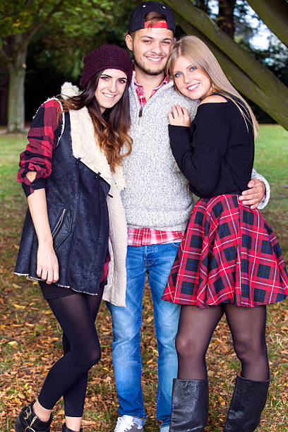 istock Group of young friends in park. 520192113