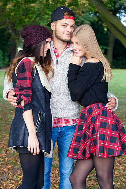 istock Group of young friends on an autumn day. 520192129