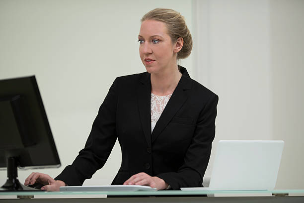 istock Businesswoman Working at Her Desk 520193343