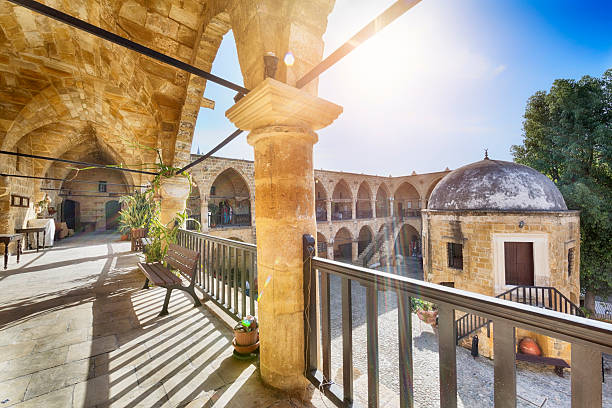 Great Inn (Buyuk Han) in Nicosia (Lefkosa), Cyprus The Great Inn (Turkish: Buyuk Han) is the largest caravanserai on the island of Cyprus. It's located in Lefkosa (Nicosia), Turkish Republic of Northern Cyprus. it was built by the Ottomans in 1572. nicosia cyprus stock pictures, royalty-free photos & images