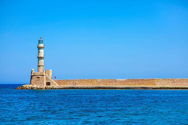 istock Entrance To Chania Harbor With Lighthouse 520194835