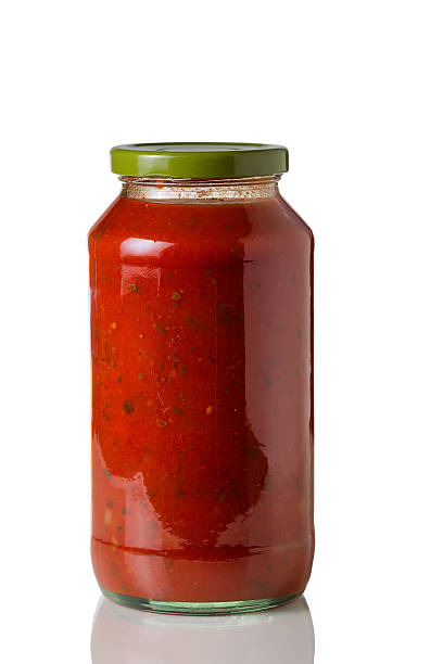 istock Jar of spaghetti sauce on White 520195293