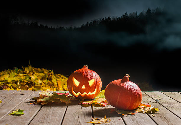 istock Halloween pumpkin smiling in the night 520214925