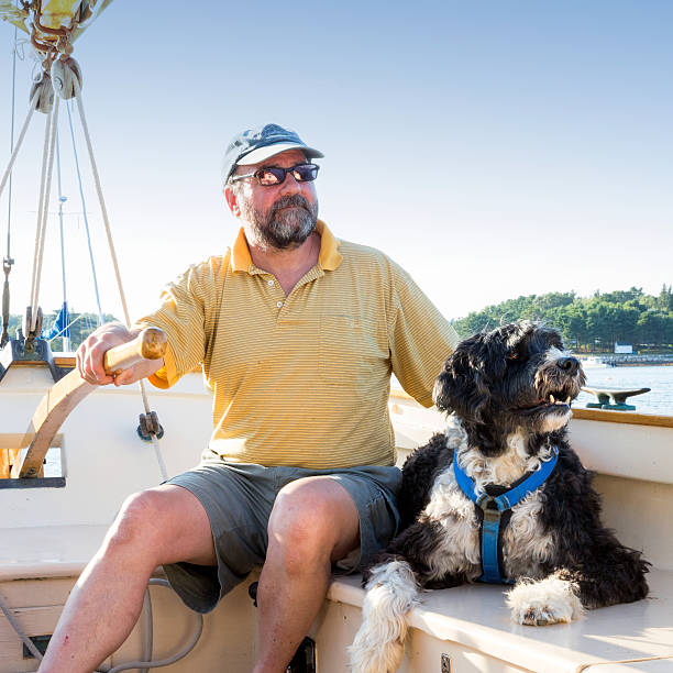 istock Senior Man and his Dog 520219623