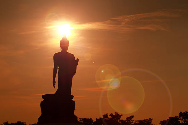 Buddha statue at sunset in the evening.