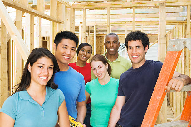 istock Group at home construction community service project, portrait 520221173