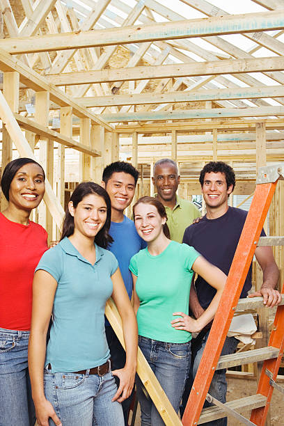 istock Group at home construction community service project, portrait 520221177