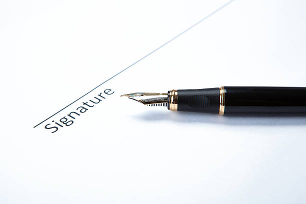 istock pen and signature 520221293