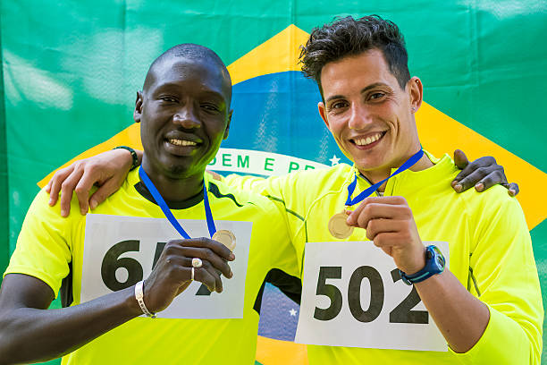 istock Athletes with gold medals 520221543