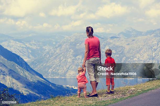 Mother With Kids Travel In Mountains Stock Photo - Download Image Now - Adult, Baby - Human Age, Baby Girls