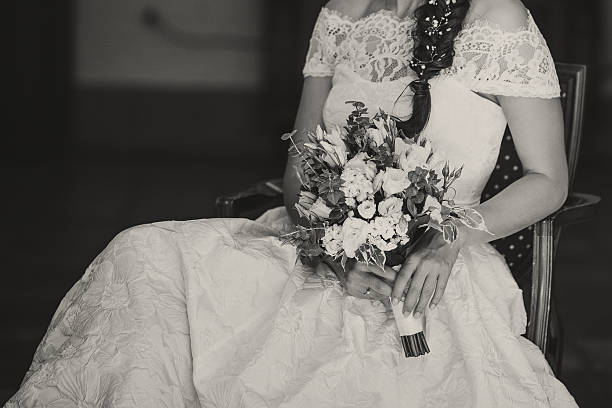 istock Bride enjoying wedding day posing with bouquet. Bridal picture. 520223164