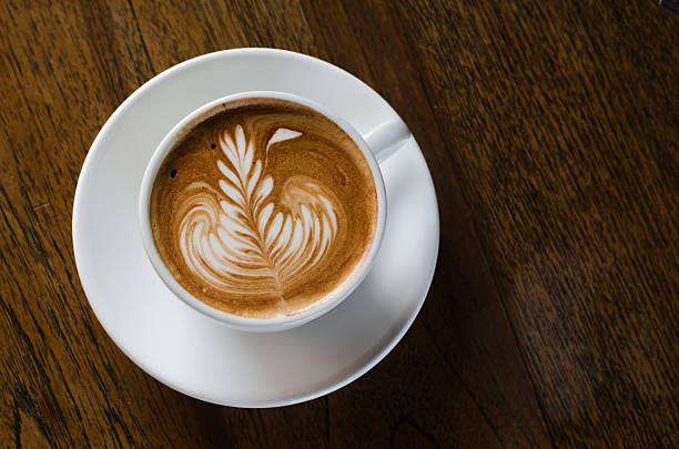 istock Barista making a cup of coffee 520223564