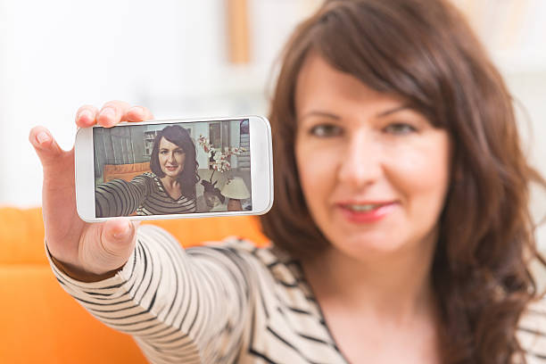 istock Woman taking selfie picture 520223820