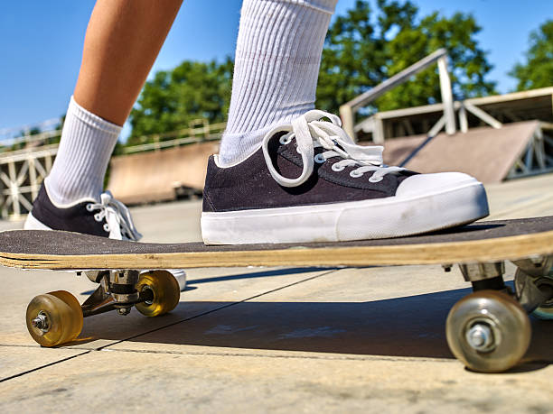 istock Girl rides on roller skates in skatepark 520224266