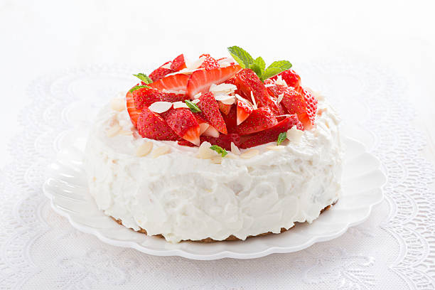 istock delicious cake with whipped cream and strawberries 520224922