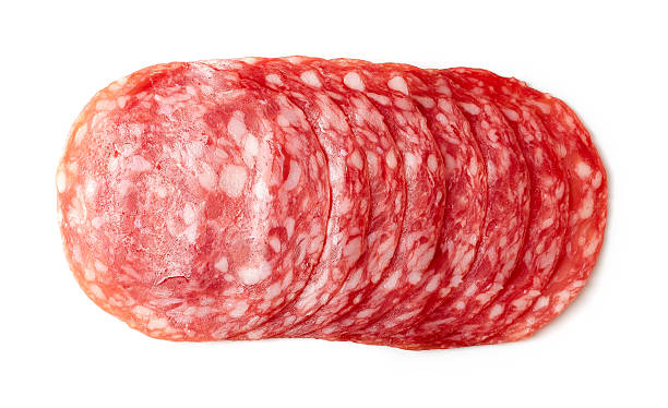 istock Sliced summer sausage on white background 520225262