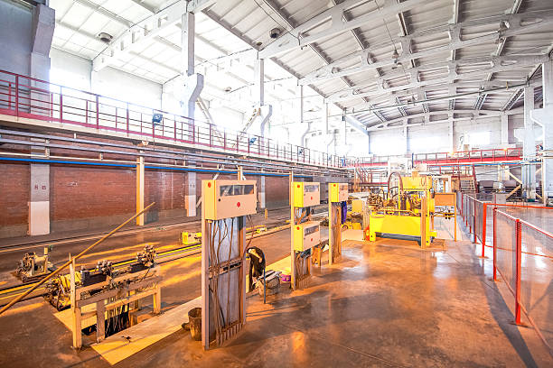 istock Modern equipment at factory producing concrete blocks 520227044