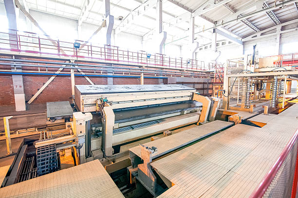 istock Modern equipment at factory producing concrete blocks 520227396