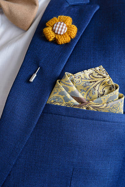 istock man in blue suit bowtie, pocket square 520227734