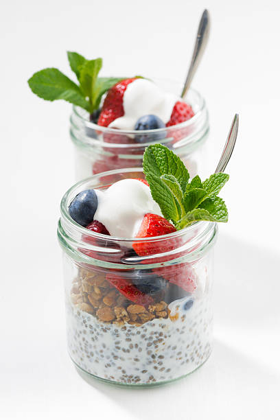 istock Breakfast in glass jar, chia with berries and oat flakes 520228136
