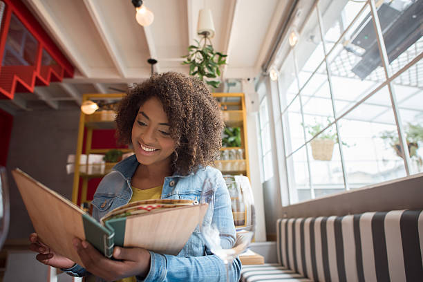 istock Woman eating at a restaurant 520229822