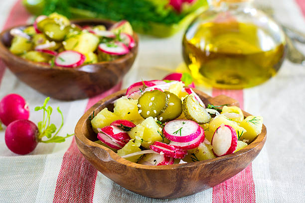 istock Warm potato salad with radish, onions, dill 520230832