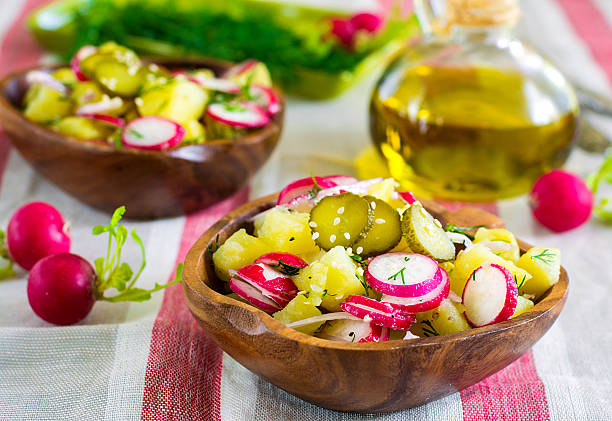 istock Warm potato salad with radish, onions, dill 520230946