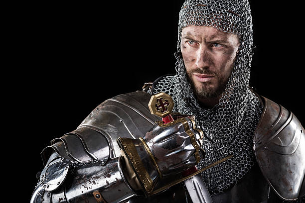 istock Medieval Warrior with chain mail armour and sword 520232002