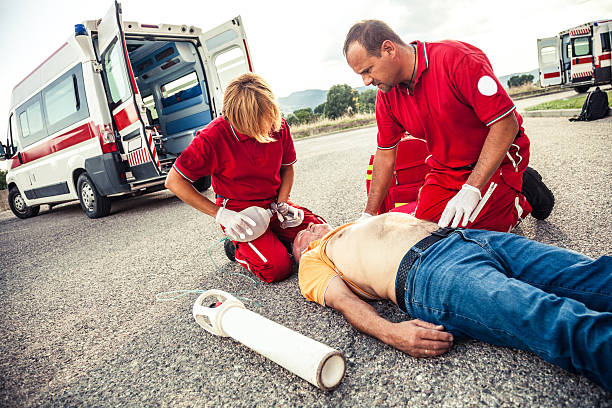 istock EMT team provide first aid on the street 520232080