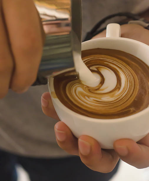 istock Barista making a cup of coffee 520232692