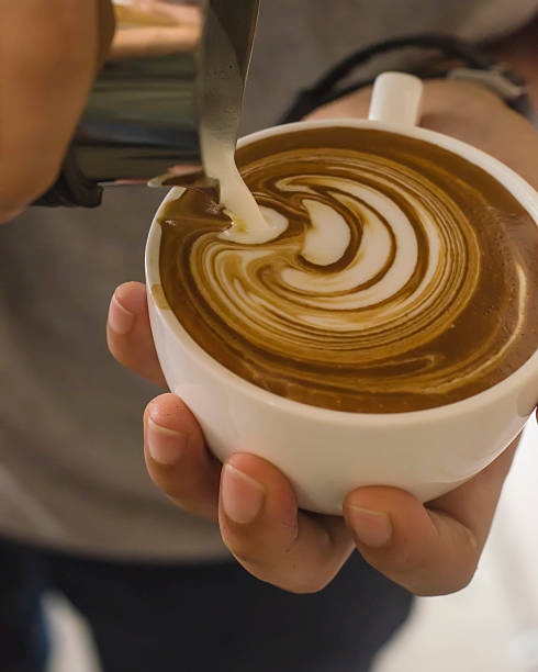 istock Barista making a cup of coffee 520232758