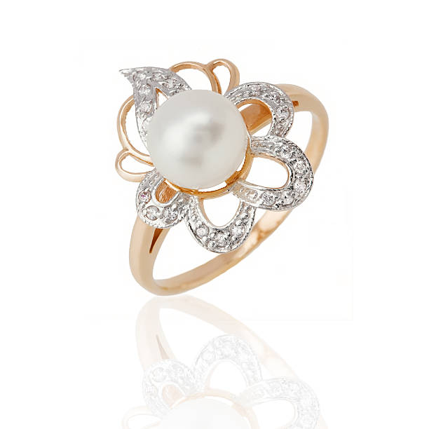 istock Jewelry ring with pearl and diamonds on white background 520232842